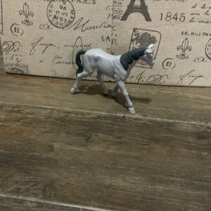 A gray mare plastic horse